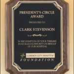 7 X 9 Walnut stained board w/ leaf design plate